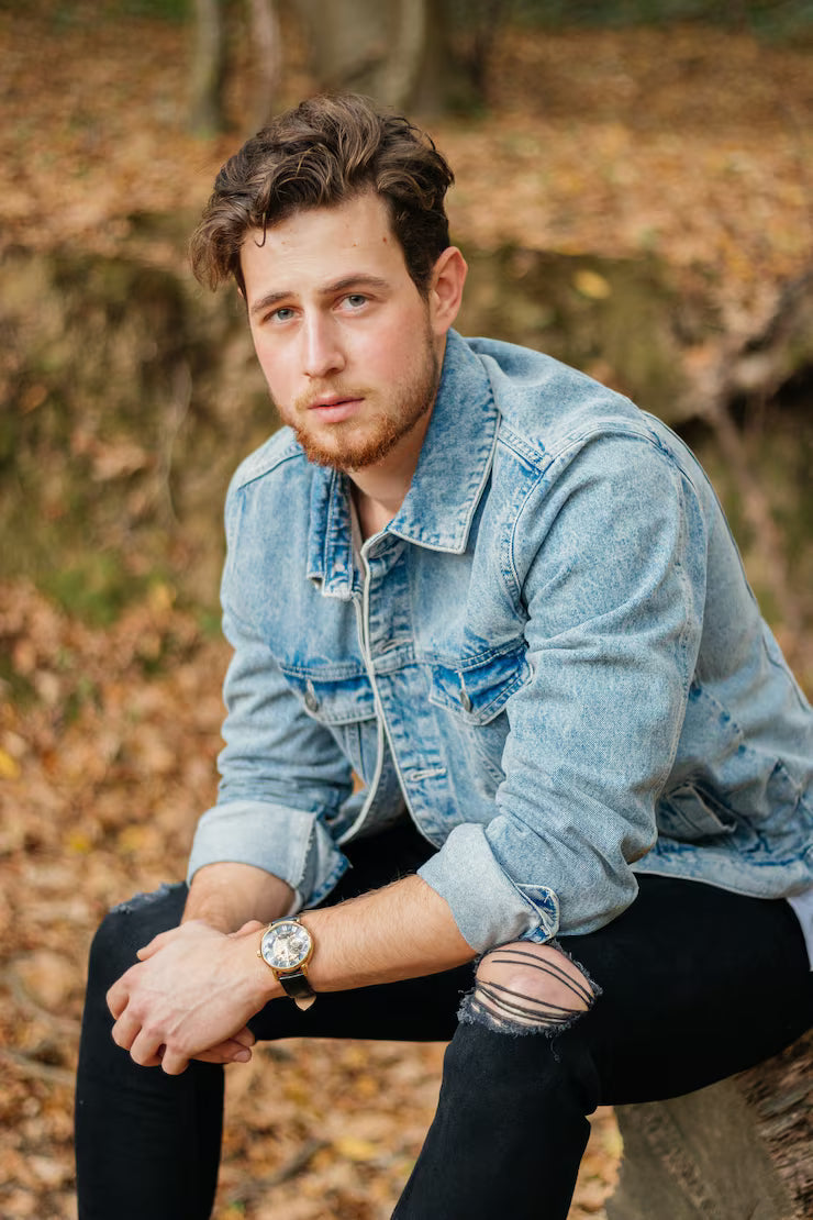 files/vertical-shot-young-handsome-guy-autumn-park_181624-41390.avif